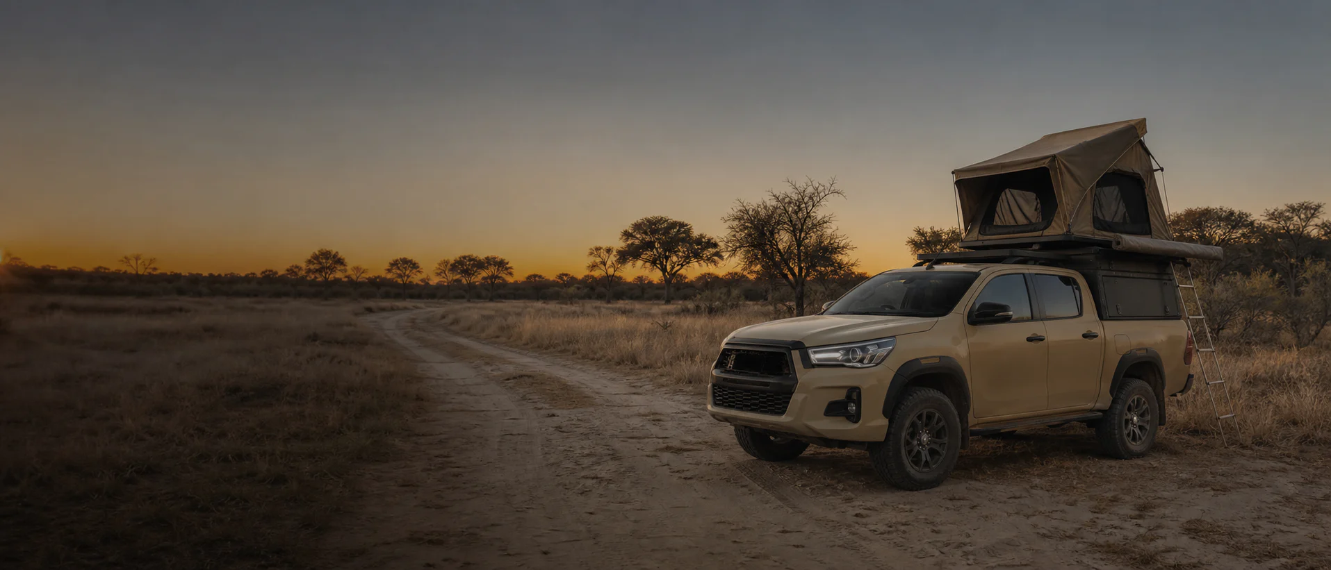 Illustrative double-cab 4x4 rooftop camper parked on an established Botswana track at dawn